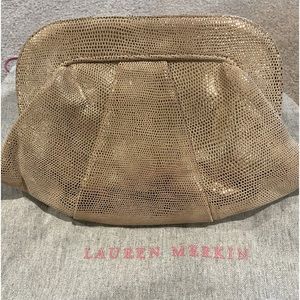 Laura Merkin gold clutch